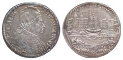 World Coins - Clemente XI (Giovanni Francesco Albani), 23 novembre 1700 – 19 marzo 1721. Mezza piastra anno VI/Veduta del porto di Ripetta; 1706, AR 16,05 g. CLEMENS – XI P M AN VIV