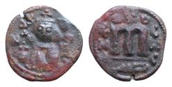 World Coins - ISLAMIC. Arab-Byzantine (Circa 685-692). Fals. Uncertain  Crowned and draped imperial bust facing, holding globus cruciger.  Large M. Very fine. 3,5g. Diameter: 19-20 mm.