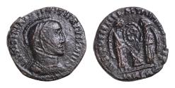 Ancient Coins - Barbaric issue, imitating Constantine I, c. 4th-5th century. Æ (16mm, 3,7g, ). Laureate, helmeted and cuirassed bust r. R/ Two victories standing facing one another, holding shield