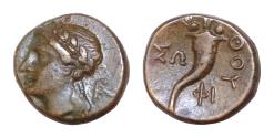 Ancient Coins - LUCANIA, Thourioi. Circa 280-213 BC. Æ (12mm, 2g, ). Laureate head of Apollo left; monogram behind neck / Cornucopia;