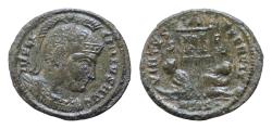 Ancient Coins - Licinius I Siscia, 320 AD. Æ Silvered  18mm follis, 2.8 g. IMP LICINIUS AUG helmeted, cuirassed bust right / VIRTUS EXERCIT two captives sitting either side of standard