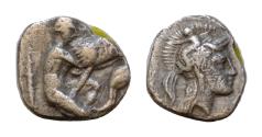 Ancient Coins - CALABRIA, Taras. 302-228 BC. AR Diobol c. 380-325 BC, AR, 9,5 mm 1,2g . Head of Athena r., wearing Attic helmet decorated with Skylla,