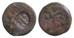 Ancient Coins - SICILY, Akragas. Circa 405-392 BC. Æ Tetras (20mm, 9g). [Uncertain type]; c/m: head of Herakles right, wearing lion skin, within circular incuse / [Uncertain type]