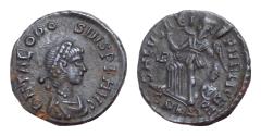 Ancient Coins - Theodosius I. AD 379-395. Cyzicus Follis Æ 13mm., 1,4g. D N THEODOSIVS P F AVG, pearl-diademed, draped, and cuirassed bust right / SALVS REIPVBLICAE, Victory advancing left,