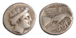 Ancient Coins - Chalkis, Euboia. AR Drachm (16mm, 2,9g), c. 338-308 BC.  Head of nymph right. X-AΛ, eagle flying right, carrying snake in talons and beak; to right, trident upwards.