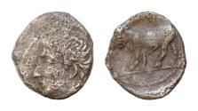Ancient Coins - SICILY, Panormos (as Ziz). Circa 405-380 BC. AR Litra 9mm, 0.44g,  Male head left; swastika behind neck / Man-headed bull standing left, head facing;