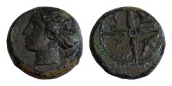 Ancient Coins - Sicily, Syracuse Æ 14mm 3,7g  Hemilitron. Circa 410-405 BC. Head of Arethusa left, wearing double loop earring and necklace, hair bound in ampyx and sphendone; dolphins