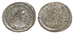 Ancient Coins - Constantine I the Great AD 306-337 Treveri 90% Silvered Follis Æ 27mm 7,5g  Constantine I, as prince of the youth, standing front in military attire, holding two vexilla.