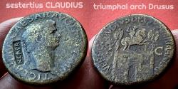 Ancient Coins - CLAUDIUS (41-54 AD) - SESTERTIUS Rome 41/42 AD - triumphal-arch-reverse with statue of his father Drusus senior - obverse counterstamped with a nice, sharp NCAPR, the coin gF