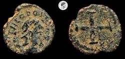 Ancient Coins - Theodosius II. 425-435 AD. Æ Nummus. Constantinople mint. VF, black patina, some earthen deposits.