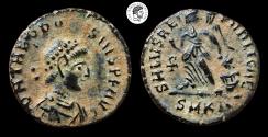 Ancient Coins - Theodosius I. AE Nummus. 379-395 AD. Cyzicus mint. Black patina with brown deposits. VF.
