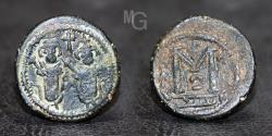 World Coins - ARAB BYZANTINE   "Justin and Sophia" type. Late 7th century AE fals, Ba'albakk mint.