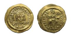 Ancient Coins - Byzantine coins: Finely centered AV gold solidus of Maurice Tiberius 582-602 AD