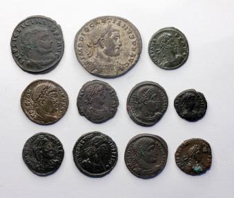 Lot of 11 nice quality late Roman bronze coins, incl. A large silvered ...