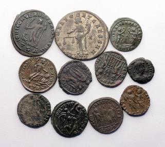 Lot of 11 nice quality late Roman bronze coins, incl. A large silvered ...