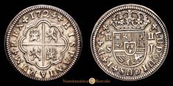 World Coins - Luis I (1724). 2 reales. 1724. Seville. J. (Cal-29). (Bustos-Sv2R-24b). Ag. 5.23 g. Variety with curved 4. Beautiful iridescent cabinet patina. Attractive specimen. Very scarce. Choice Extremely Fine (EF-).