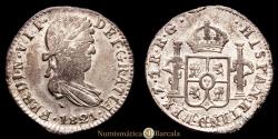 World Coins - Ferdinand VII (1808-1833). 1 real. 1821. Zacatecas. RG. (AC-714). Silver. 3.87 grams. Traces of original luster with a soft tone. Choice Extremely Fine. Very scarce in this condition.
