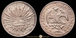World Coins - Federal Republic of Mexico. 1882 Mo MH 8 Reales. Silver (.903) Mexico City Mint (2,746,000). KM 377.10. 26.83 g. VF+. Chinese chopmarks.