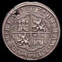 World Coins - Philip II (1556-1598). 8 Reales, 1597, Segovia. 'OMNIVM' type. Pellets flanking mint mark and denomination. Aqueduct, 26.33 g/12 h (Calicó 718, Dav. 8479). Flan defect at 1 o'clock, Choice Extremely Fine.