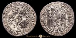 World Coins - Ferdinand and Isabella (1474-1504). 1 real. Seville. (Cal-424). Silver. 2.72 grams. Bundle of 7 arrows. 6-pointed stars. Broad shield. Fine specimen. Scarce. Choice Very Fine.