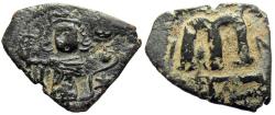 Ancient Coins - ISLAMIC, Umayyad Caliphate (Arab–Byzantine coinage). Circa 680s-700/10. Æ