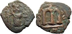 Ancient Coins - ISLAMIC, Umayyad Caliphate (Arab–Byzantine coinage). Circa 680s-700/10. Æ Fals