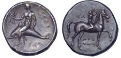 Ancient Coins - Calabria, Tarentum AR nomos c. 302 - 280 BC Phalanthus riding dolphin left/nude youth crowning horse with laurel wreath