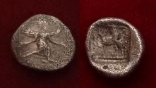 Ancient Coins - Caria, Kaunos AR obol ca 490-470 BC Winged figure griffin incuse rare