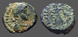 Ancient Coins - Theodosius I AE4 Victory advancing with captive.  Chi Rho or cross in field.
