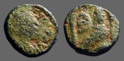 Ancient Coins - Justin I AE13 Pentanummium.  Tyche of Antioch in temple, River God below. 
