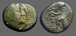 Ancient Coins - Antiochos III AE13 Apollo seated on omphalos, w. arrow
