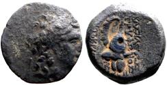 Ancient Coins - Seleukid Kings. Tryphon AE18 His Diad. Head right / Ibex Helmet