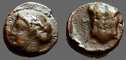 Ancient Coins - Ionia, Magnesia Maeandrum. AE8 Hd of Apollo / Breastplate Armor