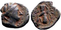 Ancient Coins - Seleukid Kings. Seleukos III AE15 Artemis / Apollo Delphios seated on omphalos