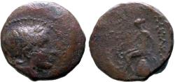 Ancient Coins - Seleukid Kings. Antiochos III AE23 Apollo seated on omphalos