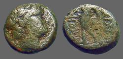 Ancient Coins - Antiochus III AE12 Hd of Apollo / Apollo standing left, holds arrow and bow. 