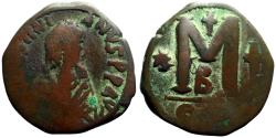 Ancient Coins - Justinian I AE29 Follis. 2 cross, 1 star. Constantinople