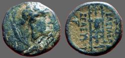 Ancient Coins - Seleukid, Seleukos II AE12 Apollo / tripod w. Satyr mask