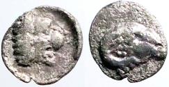 Ancient Coins - Caria, uncertain mint AR7 Tetartemorion.  Ram / Lion