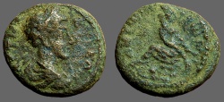 Ancient Coins - Commodus AE18 Decapolis, Gerasa.  Tyche on rocks, River god below