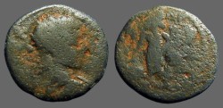 Ancient Coins - Elagabalus AE21 Caesarea. Tyche stg left w. foot on harbor god 