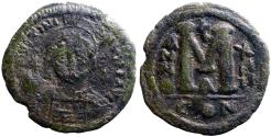 Ancient Coins - Justinian I AE37 Follis.  Facing bust.  Constantinople.  year 14