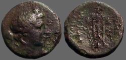 Ancient Coins - Phrygia, Eumeneia AE21 Dionysos / Tripod w. serpent entwined double axe