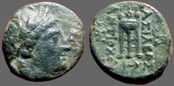 Ancient Coins - Seleukid. Antiochos II AE16 Apollo / Tripod Altar