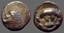 Ancient Coins - Caria. AR8 Hemiobol.Lion's hd. left / Lion's hd. facing