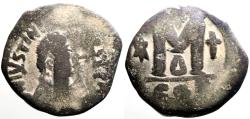 Ancient Coins - Justinian I AE30 Follis. 2 cross, 1 star. Constantinople