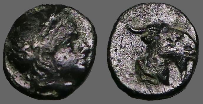 Ancient Coins - Aeolis, Aigai, AE10 Laureate head of Apollo / Head of goat right.