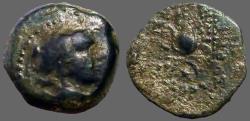Ancient Coins - Antiochos VII AE17  Bust of Eros / Head dress of Isis
