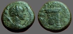 Ancient Coins - Syracuse, Sicily, under Roman rule AE14 Hd of Apollo / Sacraficial Cap  