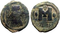 Ancient Coins - Justinian I AE30 Follis. 1 cross, 2 star.  Antioch